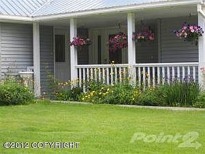 view of flowers front porh