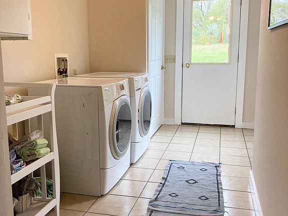 Sunny back entrance; mud/Laundry room & additional storage
