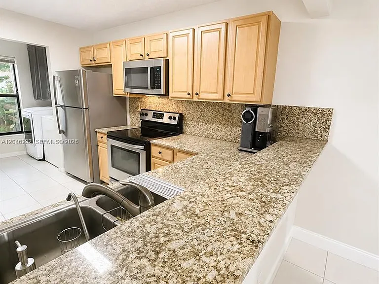 7954 NW 41st Ct — Photo 16