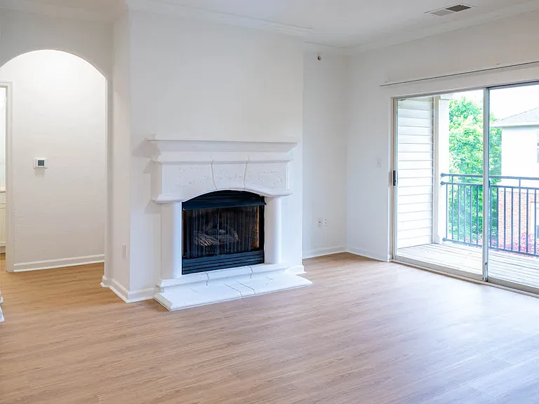 Living Room with Balcony and Fireplace