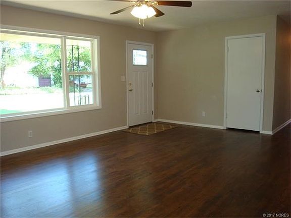 Front door entrance with new front door and windows.