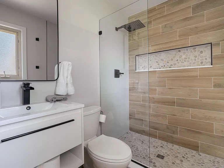 Can you believe that this would be your king suite master bath? It's beautiful and private with a walk-in shower and waterfall shower head. Ahh, the luxury. You will be spoiled!