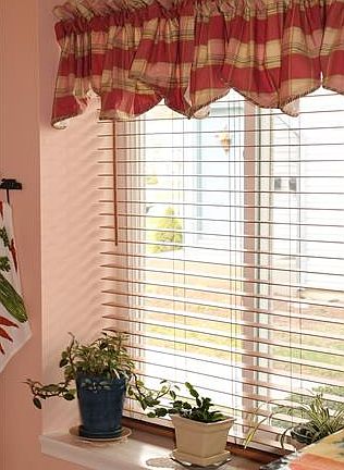 Large window is kitchen mak...