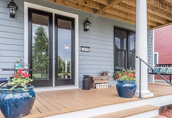 A beautiful porch says WELCOME HOME!