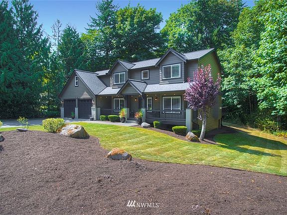The lot is spacious and backs up to a community greenbelt.  