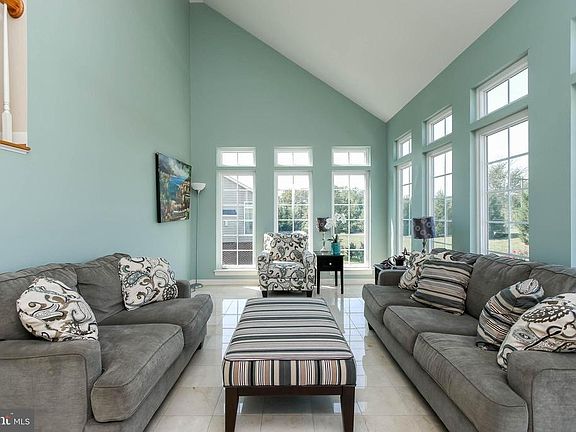 GORGEOUS SUN ROOM WITH A TON OF NATURAL LIGHT