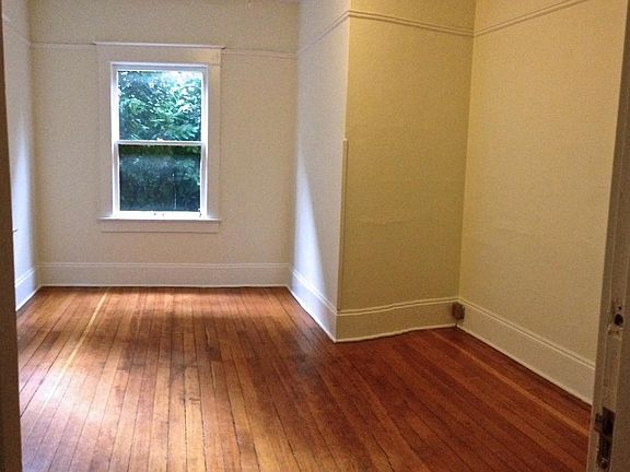 Bedroom has fir flooring, fits queen size bed, has nice size