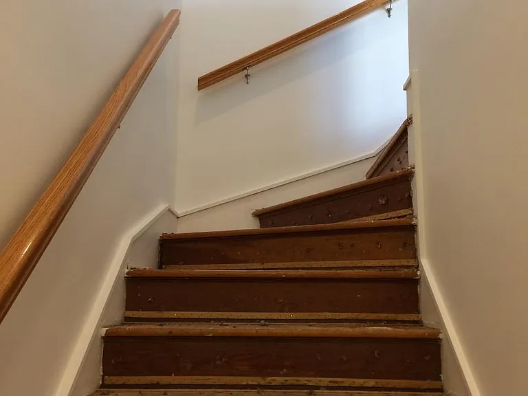 The stairs up to the condo