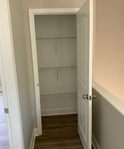 Hallway linen closet in hallway