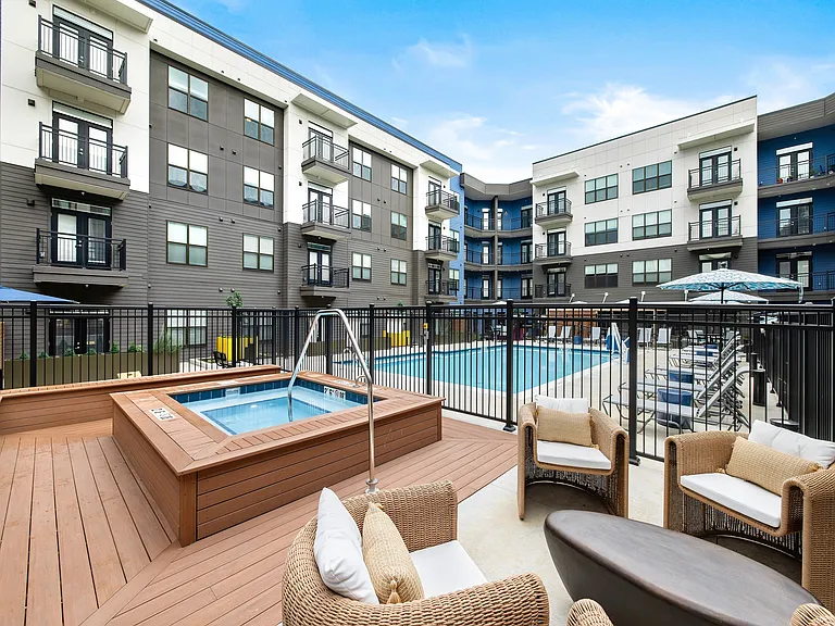 wading pool attached to a swimming pool area