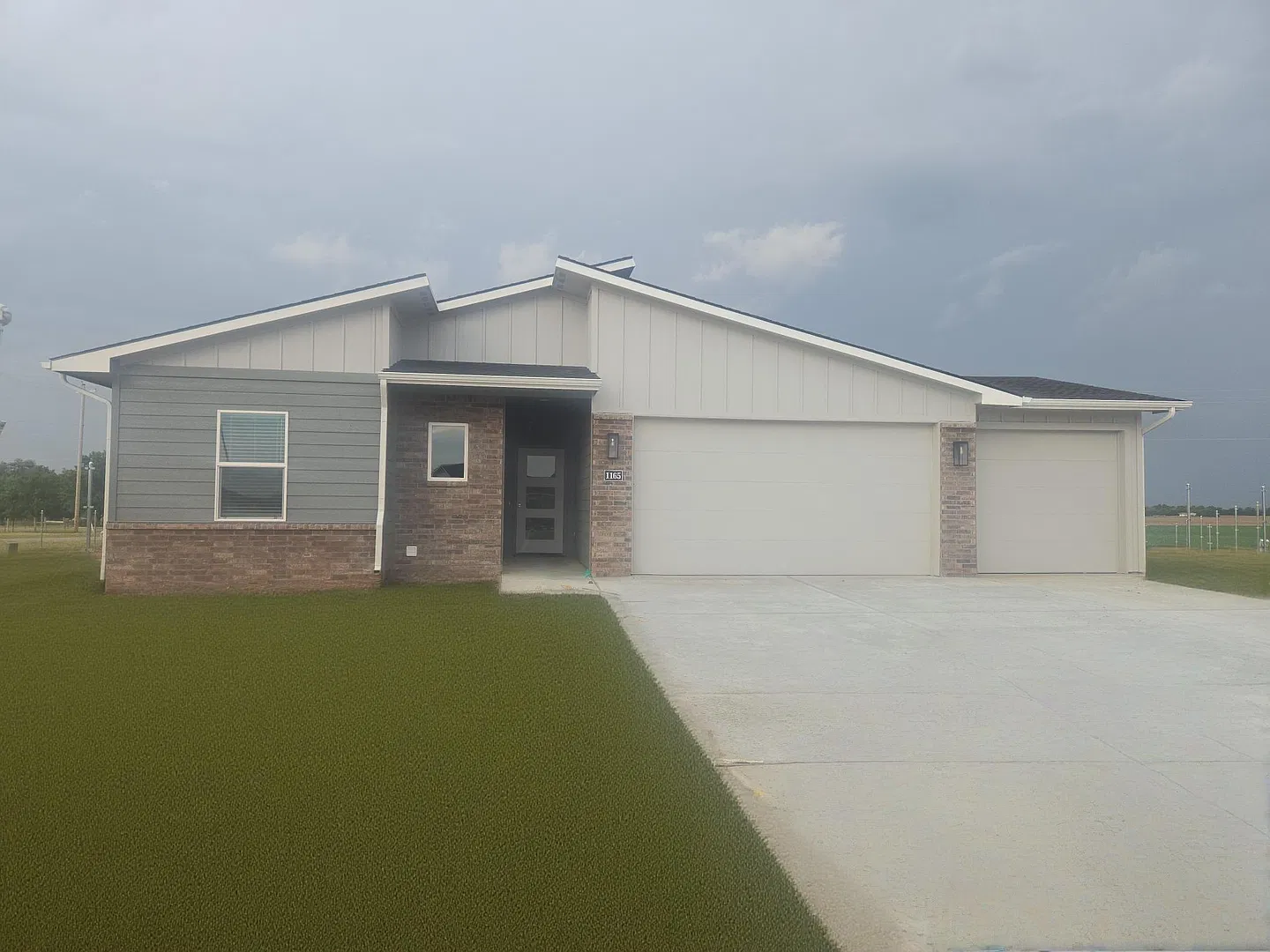 Newer Trails End Home with 3-Car Garage & Massive Fenced Yard — Photo 1
