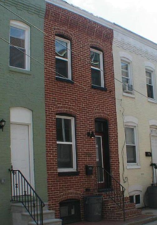 Brick front with black windows