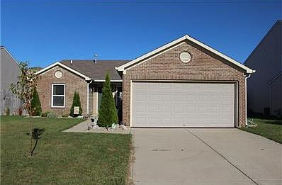 Front View.  New plantings in flower beds