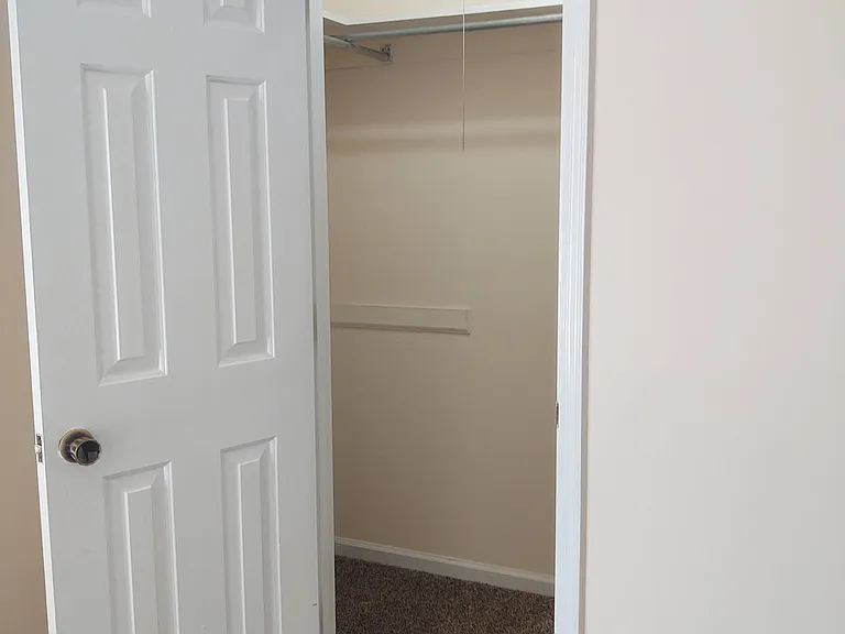 Walk-in closet front bedroom.