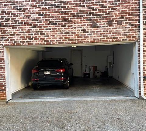 Private two car garage; other cars can park steps away on the street.