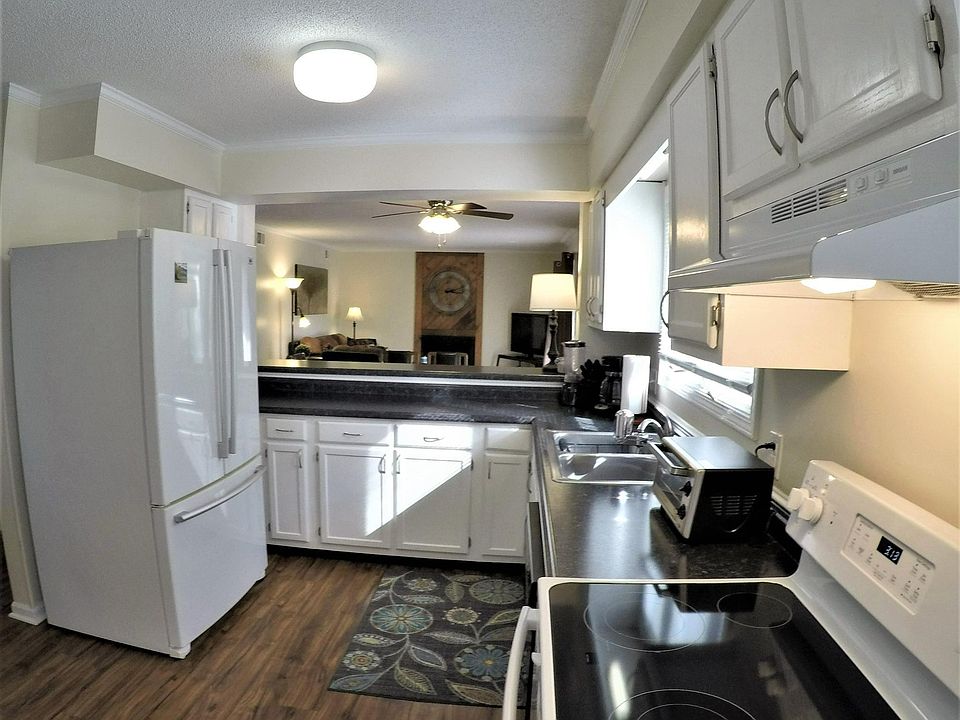 Large capacity french door fridge, Whirlpool dishwasher, open to living room and dining area