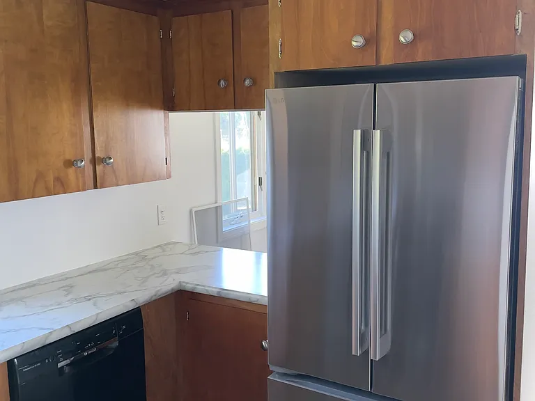 New refrigerator and electrical outlets.