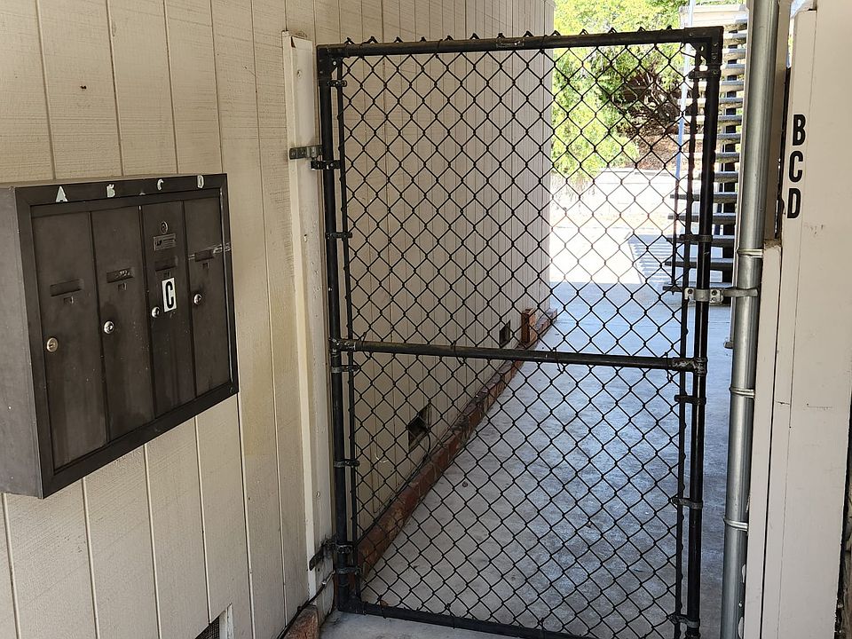 Entryway of the property complex. Mailboxes on the left