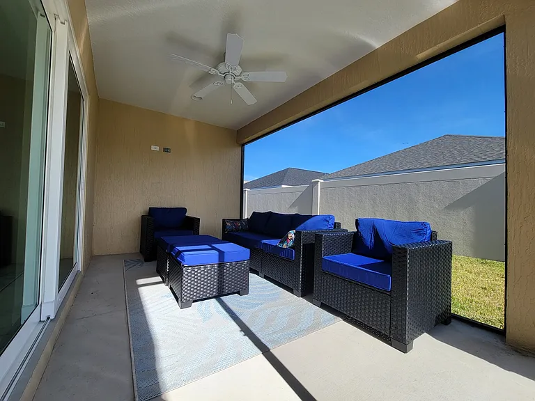 TV Ready Enclosed Birdcage/Lanai Patio with Ceiling Fan.