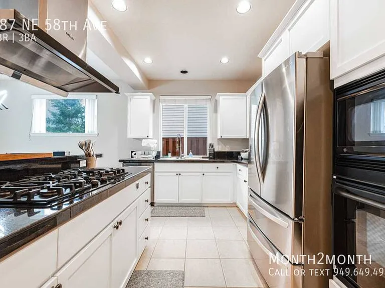487 NE 58th Ave — Photo 8