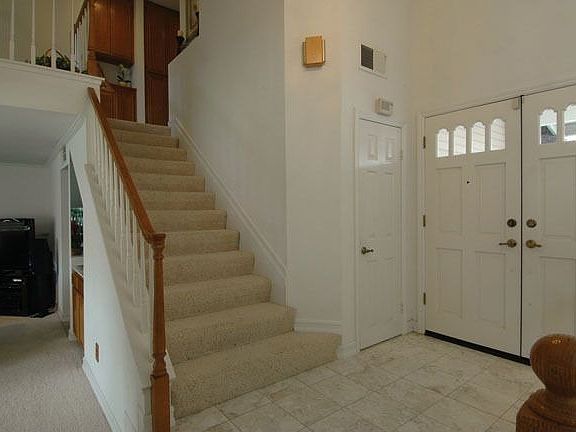 FRONT STAIRCASE ENTRANCE