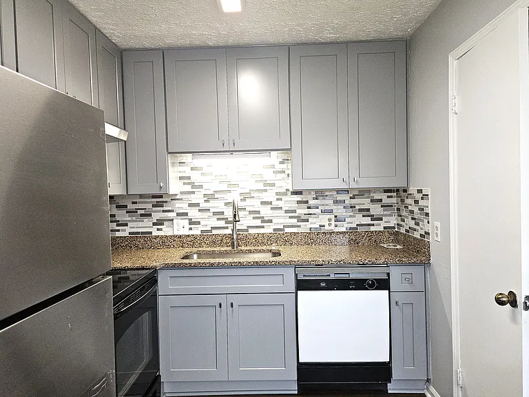 New Kitchen Slow-Close Cabinets and Granite Counter Top