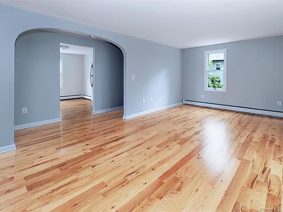 Spacious light-filled living room.