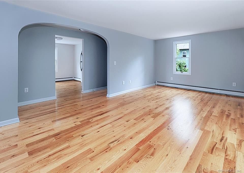 Spacious light-filled living room.