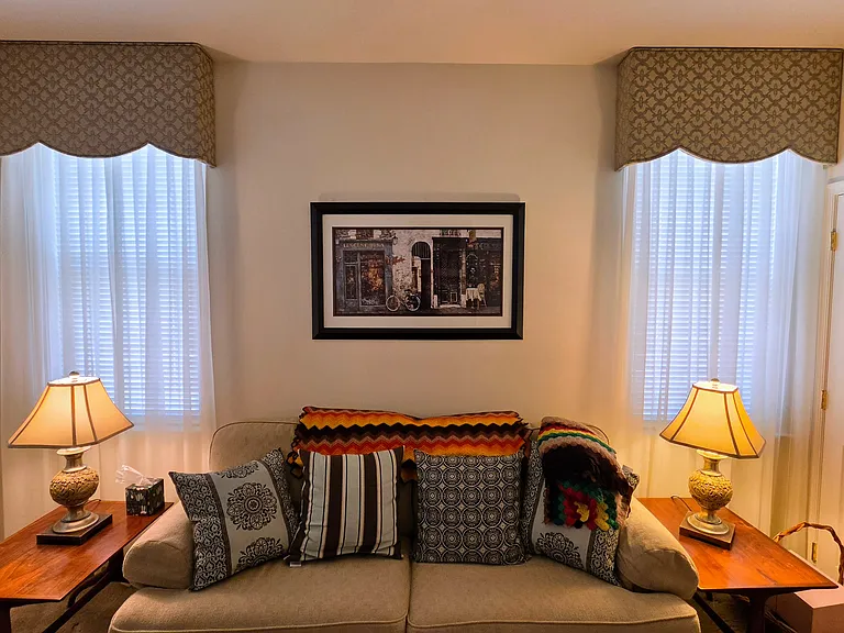 Symmetrical and spacious guest room layout with dual bright windows_perfect for a quiet bedroom suite or premium office.