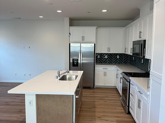 Open kitchen w/new appliances, new , new...slow close drawers.