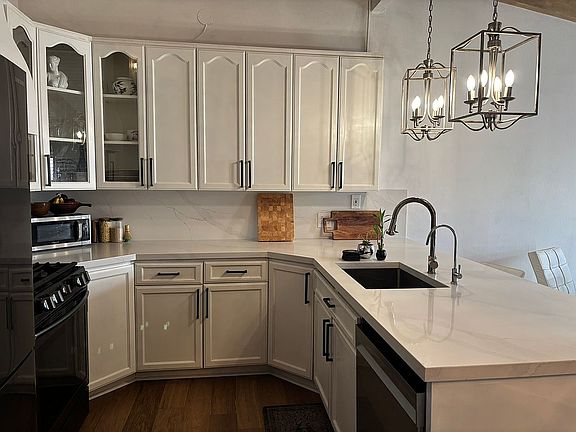4th image of 7924 Woodman Ave Unit 48