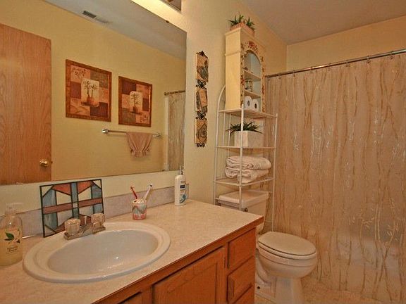 Full guest bathroom in the upper level.