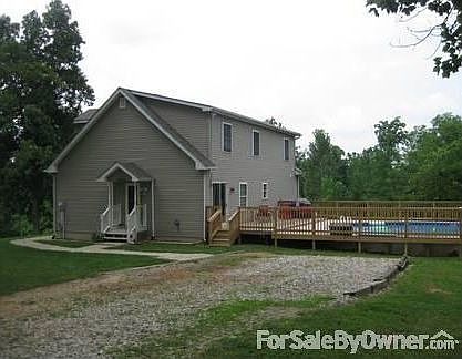 Side of house : Side of house with view of new deck and pool