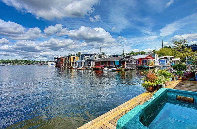 A water-side, broad deck provides great outdoor living space: water’s edge dining, hot-tubbing & simply enjoying the dramatic open water connection.