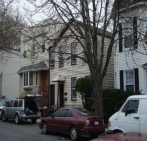 Lovely 2 family on dead end block bordering Forest Park
