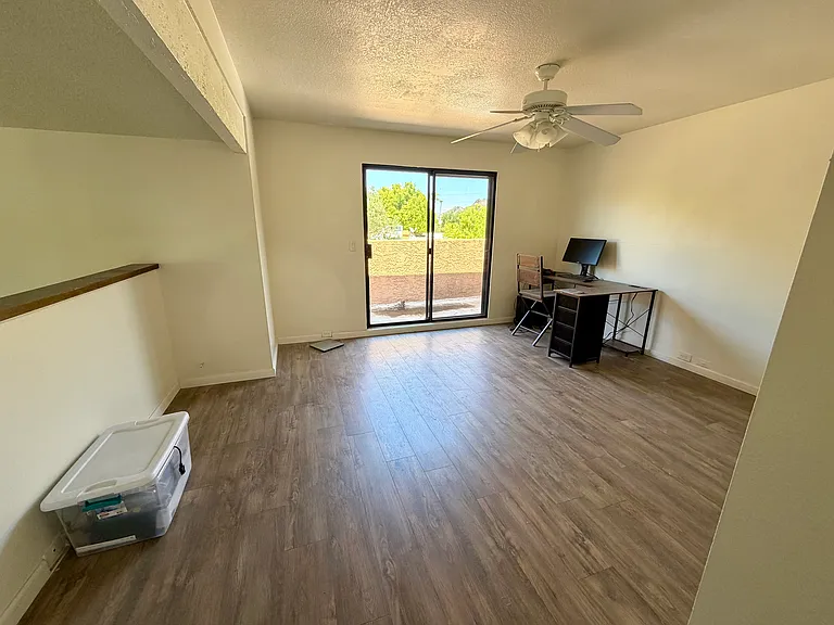 Upstairs loft/bedroom with patio and mountain views.