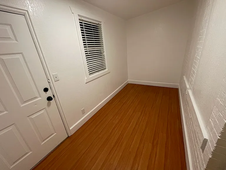 2nd Bedroom. No closet, but makes a great office, shop or expanded walk in closet.