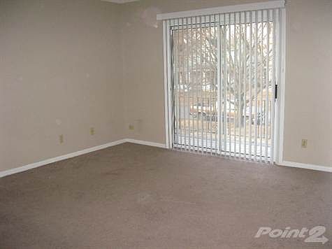 Sliding glass door exits to balcony