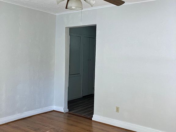 the living room has 2 large windows