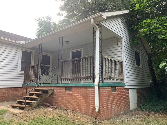 Back Porch with Separate Entrances to Master and Dining Room
