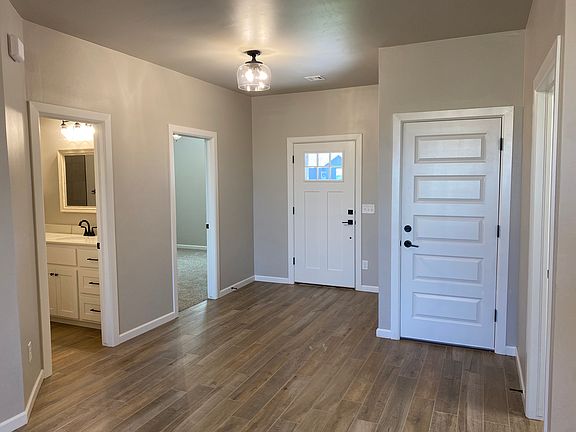 Front Entry Door
Door to Garage (on the Right)
Door into Bedroom #2 and Guest Bathroom (On the Left)