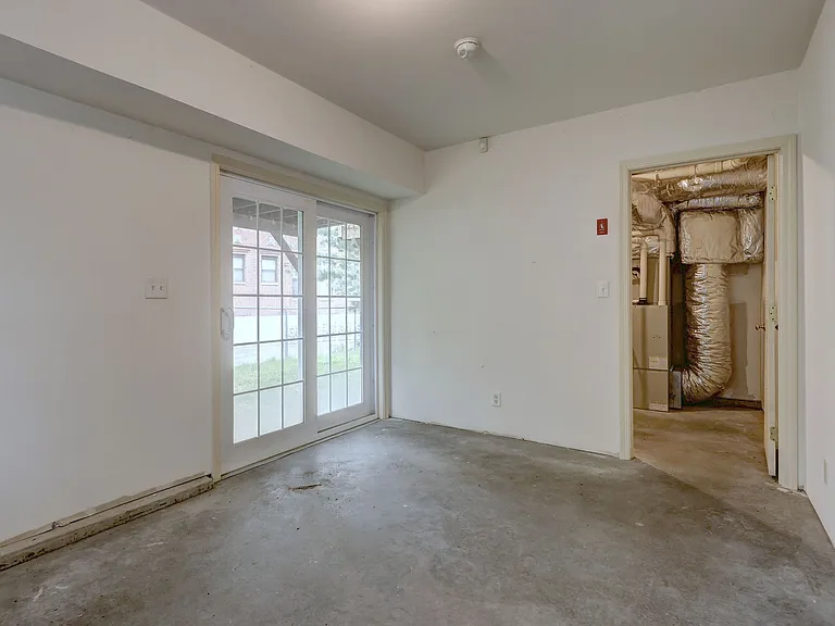 room behind the garage, not heated.