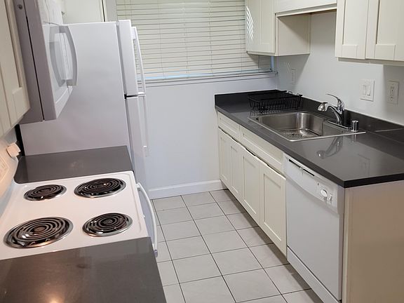 kitchen area with granite counter tops