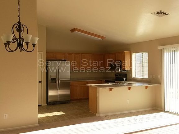 2nd image of 16055 W Saguaro Ln