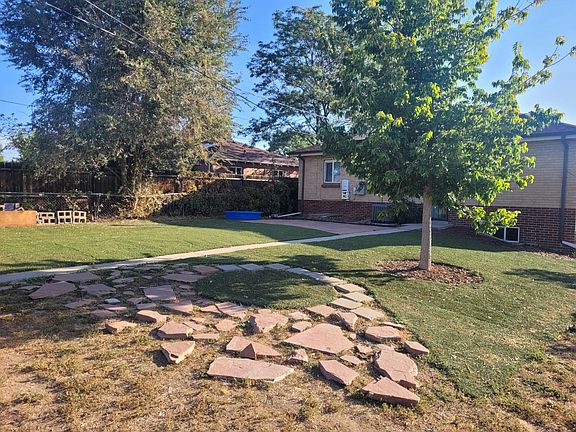Artificial grass no watering but great for outdoor fun!!!