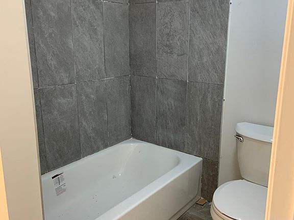 Brand new tub and toilet. Never been used ! (Bathroom is currently being finished)