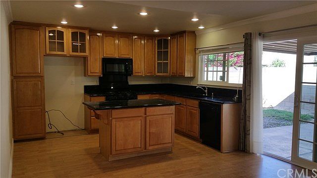kitchen w granite counter top.