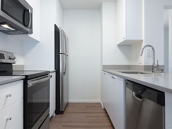 Renovated Package I kitchen with hard surface flooring