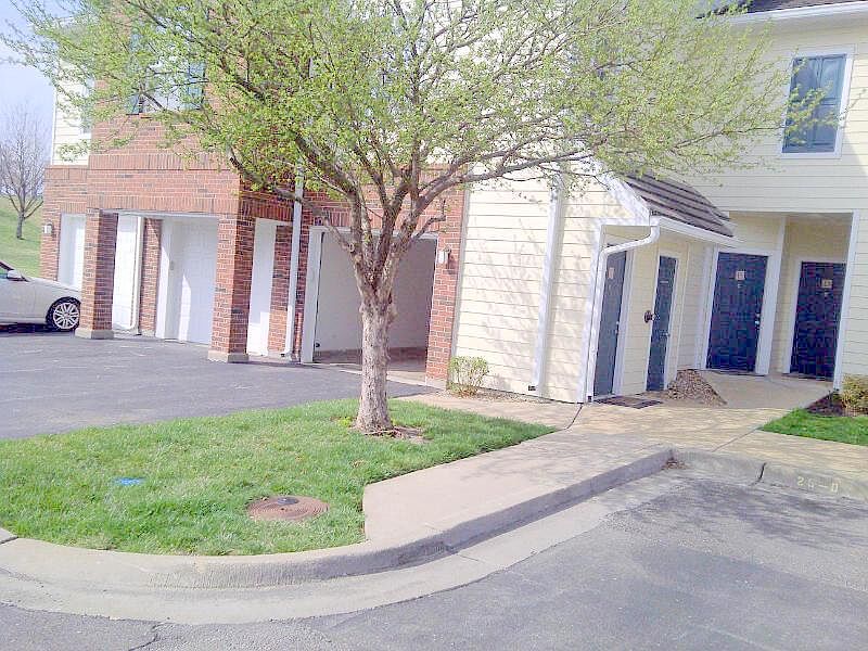 Entrance through garage or door.
Garage door is open in this view