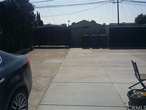 Back yard showing parking space available for 6 - cars or more
